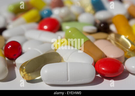 many pills, capsules and tablets - pile of medication Stock Photo
