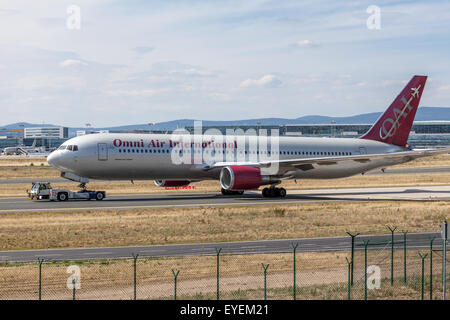 Omni Air International Boeing 767-300 ER at the Frankfurt International Airport (FRA). July 26, 2015 in Frankfurt Main, Germany Stock Photo
