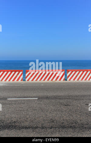 empty road with ocean panorama and clear blue sky Stock Photo