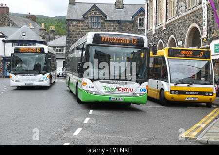 Dolgellau, Gwynedd, Wales Three bus company bus services in Eldon Square in the centre of Dolgellau in July Stock Photo