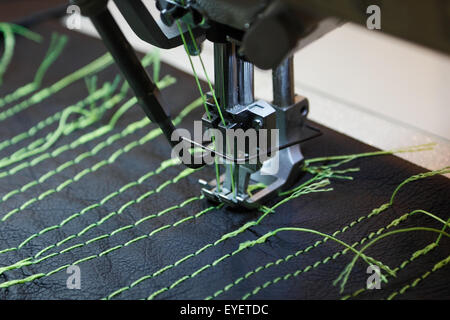 Detail of professional sewing machine with two needles. Stock Photo
