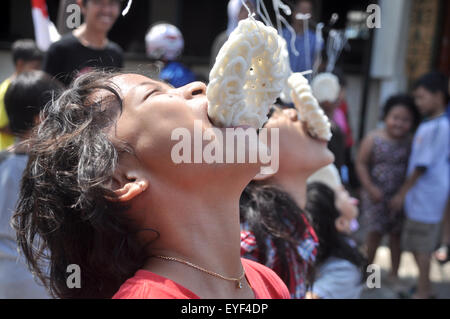 Kerupuk eat race is one of activities of the Indonesian people to celebrate Independence day on August 17 Stock Photo