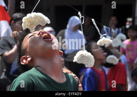 Kerupuk eat race is one of activities of the Indonesian people to celebrate Independence day on August 17 Stock Photo