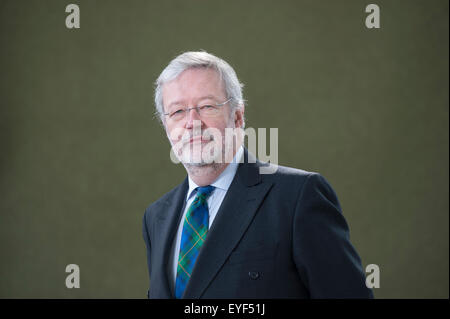 Civil servant, professor and company director, Jim Gallagher, appearing