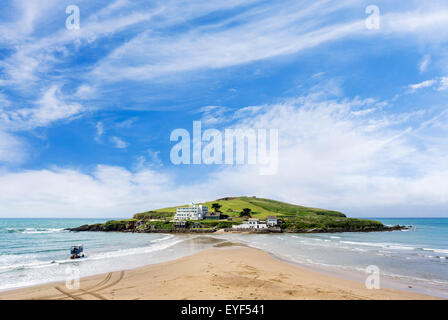 The Burgh Island Hotel and Pilchard Inn with the sea tractor in the foreground, Burgh Island, Bigbury-on-Sea, Devon, England, UK. Example of a tombolo Stock Photo