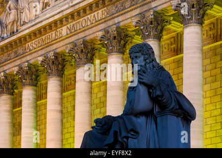 Evening below Jean-Baptiste Colbert statue and the Assemblee Nationale, Paris, France Stock Photo
