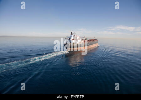 oil tanker steaming away aerial Stock Photo