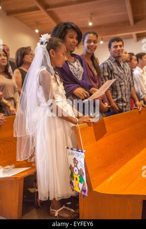 Wearing formal first communion dresses hi res stock photography