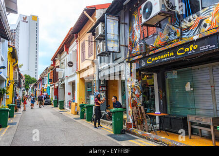 Typical shophouses, with retail shops on street level and residences on the upper floor in the Little India district of Singapor Stock Photo