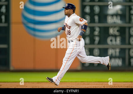 Houston Astros' Chris Carter rounds first after a solo home run