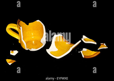 Broken Orange Coffe Cup Stock Photo