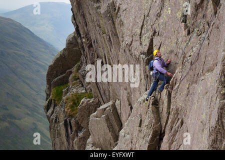 Rock climbers on Great Gable, in the Lake District UK climbing on the Tophet Wall Stock Photo