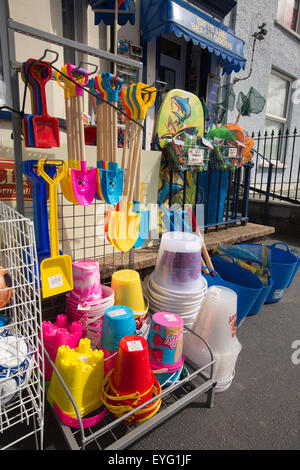 UK, Wales, Gwynedd, Aberdovey, seafront beach supplies shop selling plastic buckets and spades Stock Photo