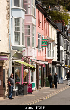 UK, Wales, Gwynedd, Aberdovey, colourfully painted seafront shops Stock Photo