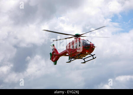 UK, Wales, Gwynedd, Towyn, Wales Air Ambulance taking off from Tywyn playing fields Stock Photo