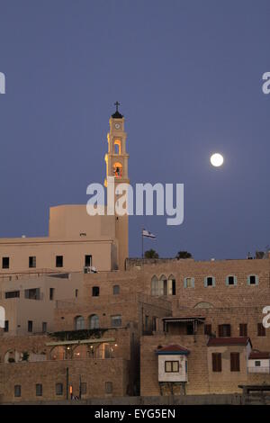 Israel, Tel Aviv-Yafo, a moonrise over the Franciscan St. Peter's Church in Old Jaffa Stock Photo