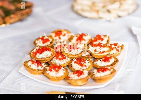 Tartlet  with cream and caviar Stock Photo