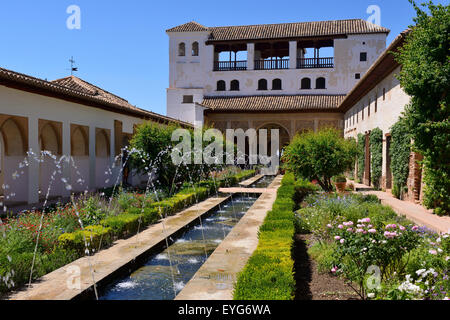 Fountains and water channel in Patio de la Acequia and Northern Pavilion of  Generalife Palace in Granada, Andalusia, Spain Stock Photo