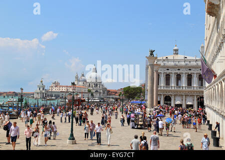 People at Riva Degli Schiavoni waterfront near San Marco square, Venice Stock Photo