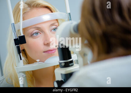 Lady having eye examination Stock Photo