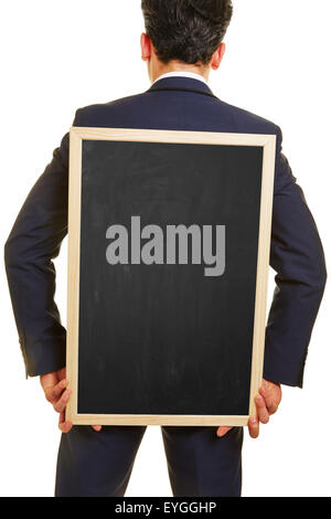 Business manager carrying empty blackboard on his back Stock Photo