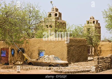 Niger, Central Niger, Tahoa region, View of traditional mud brick village mosque in background; Yaama Village Stock Photo