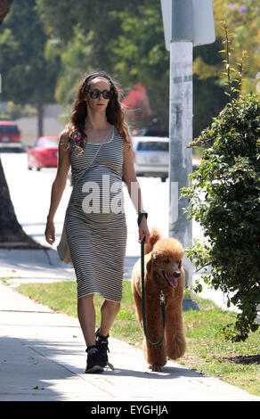 Jeff Goldblum's pregnant wife Emilie Livingston shows off her baby bump while walking their dog in West Hollywood  Featuring: Emilie Livingston Where: West Hollywood, California, United States When: 28 May 2015 C Stock Photo