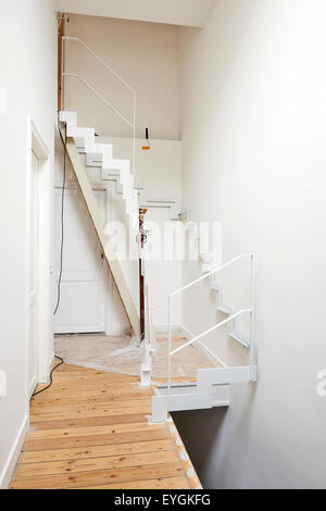 New stairs under construction in a old renovated house Stock Photo