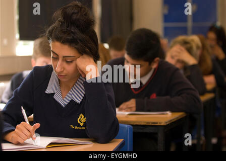 Secondary school pupils studying in class, Surrey, UK. Stock Photo