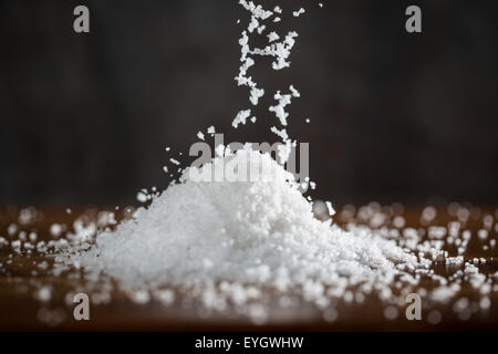 white sea salt crystals with dark background Stock Photo