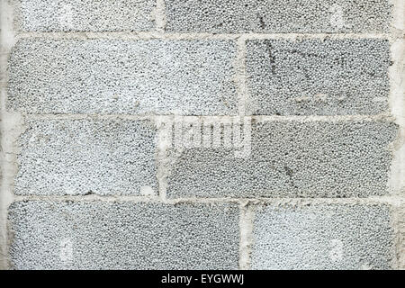 Close-up of a grey concrete block wall texture background Stock Photo