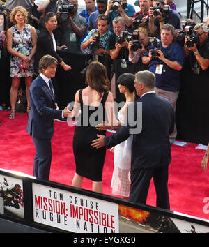 New York, NY, USA. 27th July, 2015. July 27, 2015 - New York, New York, USA - Tom Cruise, left, Ireland Baldwin, Hilaria Thomas Baldwin and Alec Baldwin attend the premiere of the film Mission Impossible-Rogue Nation in New York's Times Square. © KC Alfred/ZUMA Wire/Alamy Live News Stock Photo