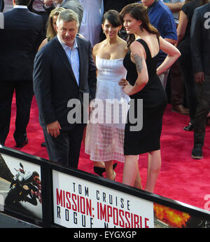 New York, NY, USA. 27th July, 2015. July 27, 2015 - New York, New York, USA - Alec Baldwin, left, his wife Hilaria Thomas Baldwin and daughter Ireland Baldwin attend the premiere of the film Mission Impossible-Rogue Nation in New York's Times Square. © KC Alfred/ZUMA Wire/Alamy Live News Stock Photo