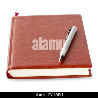 Diary in brown leather cover with silver pen isolated on white background Stock Photo