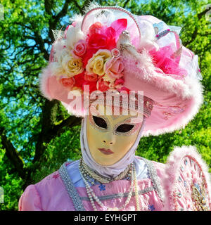 MOUSCRON, BELGIUM-JUNE 06, 2015: Participants of defile in costumes of Carnival de Venice in Parc Communal during 6 edition of V Stock Photo