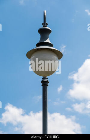 Vintage Street Light Pole Against Blue Sky Stock Photo