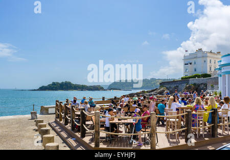 The Waterfront bar and restaurant with Drake Island in the background, Grand Parade, Plymouth, Devon, England, UK Stock Photo