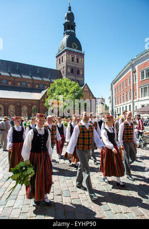 People in national costumes at the Latvian National Song and Dance Festival Stock Photo