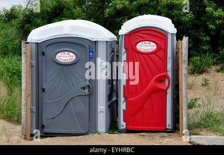 Brewster, MA:  Two portable toilets at Corporation Beach on Cape Cod provide free sanitary facilities during the summer Stock Photo