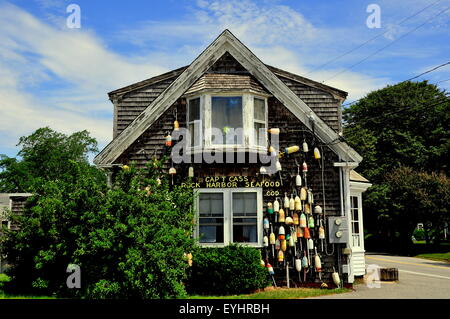 Orleans, Massachusetts:  Captain Cass Rock Harbor Seafood Restaurant with lobster buoys covering a side wall Stock Photo