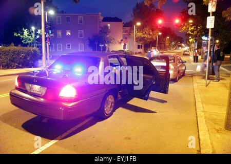 Plain Clothed police officers stop a car in Boston, Massachusetts, USA Stock Photo