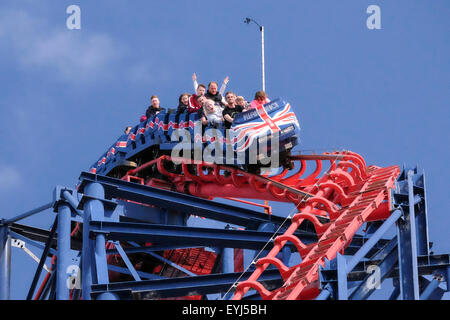 Holidaymakers taking a ride on ‘the big one’ on Blackpool Pleasure Beach. Stock Photo