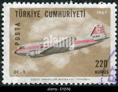 TURKEY - CIRCA 1967: Postage stamp printed in Turkey, depicted airplane Douglas DC-3, circa 1967 Stock Photo