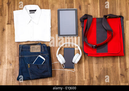 Informal male outfit with electronics, background Stock Photo