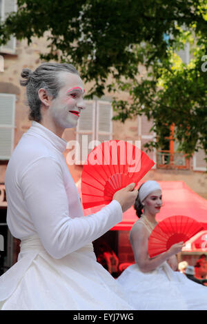 Street theater festival. Wandering in the street. Cie des Mangeurs de Cercle; 'Crinoline' show. Aurillac, Cantal, France Stock Photo