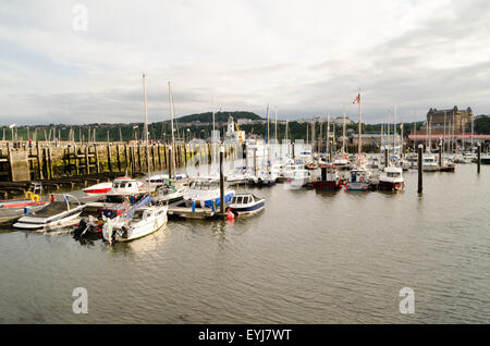 Boats at Scarborough Harbour, located in the South Bay, Scarborough Stock Photo