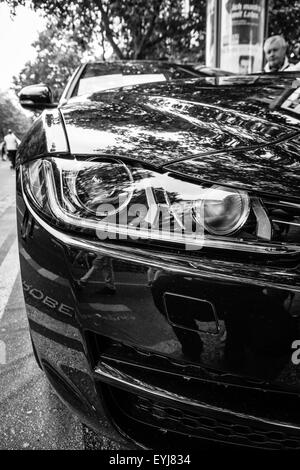 Fragment of the compact executive car Jaguar XE 20D (since 2015). Black and white. The Classic Days on Kurfuerstendamm. Stock Photo