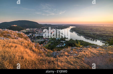 View of Small City of Hainburg an der Donau with Danube River as Seen from Braunsberg Hill at Beautiful Sunset Stock Photo