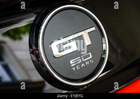 BERLIN - JUNE 14, 2015: The emblem of a pony car Ford Mustang 50th Anniversary Edition, 2015. The Classic Days on Kurfuerstendam Stock Photo