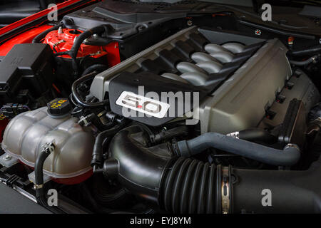 BERLIN - JUNE 14, 2015: Engine of a pony car Ford Mustang 50th Anniversary Edition, 2015. The Classic Days on Kurfuerstendamm. Stock Photo